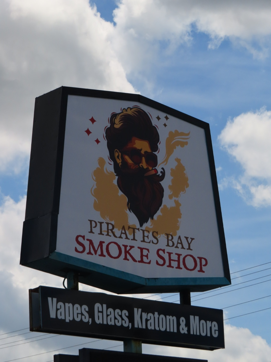 Pirates Bay Smoke Shop pirate mascot road sign on Blanding Blvd