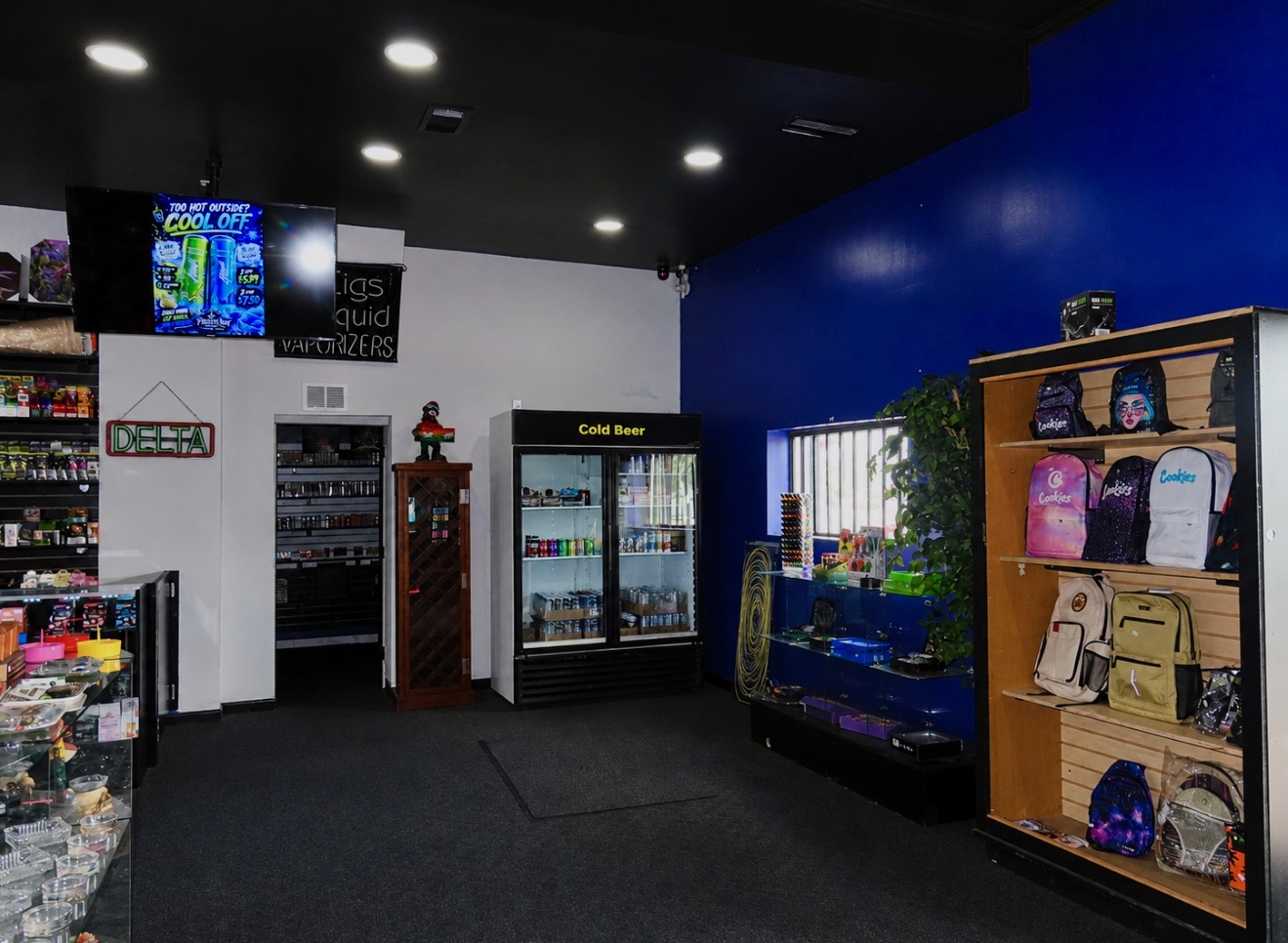 Cold beer cooler, Cookies backpacks and Delta neon inside Pirates Bay